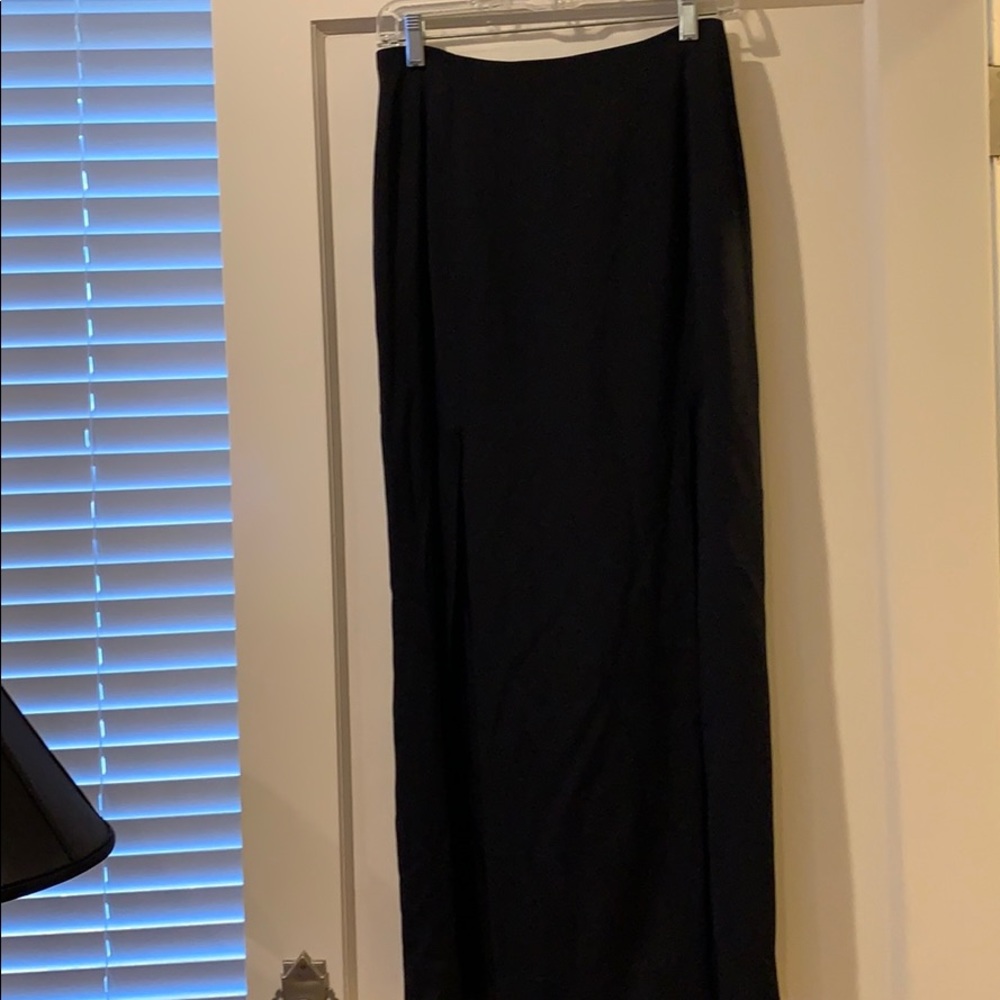 Long skirt with two large slits for each leg